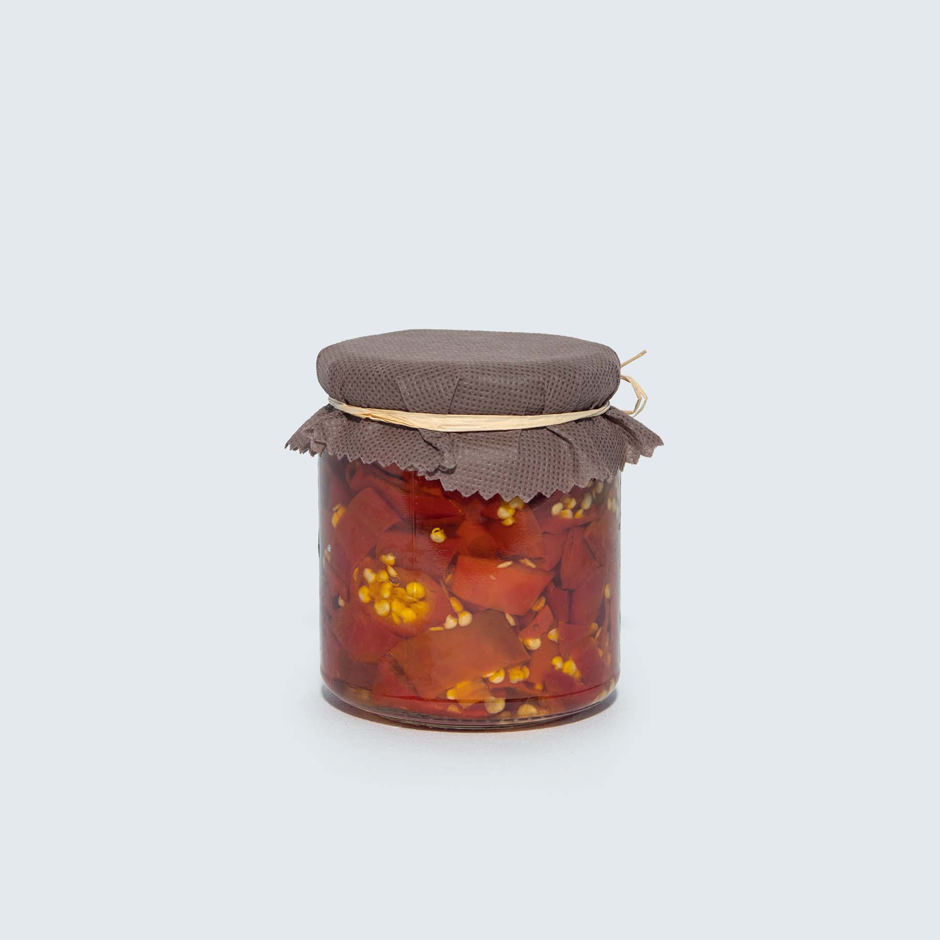 Peperoncino a rondelle vista posteriore Vasetto di peperoncino piccante a rondelle vista posteriore